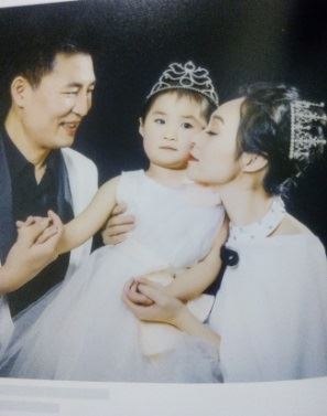 Gospodin Wang, gospođa Zhu i njihova kći