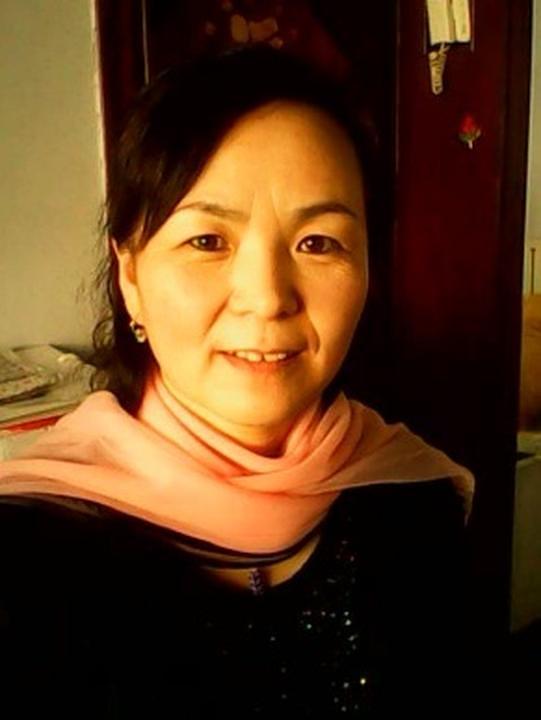 Gđa Cheng Shujie, Shangova supruga, također prakticira Falun Gong 