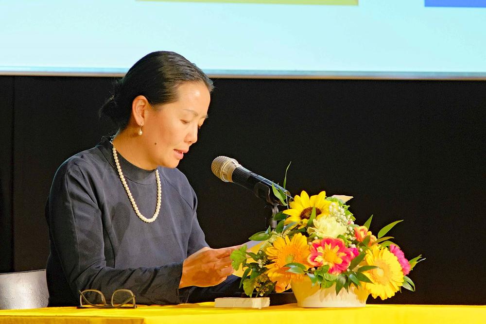 Xing je govorila o tome kako živi u skladu s Falun Dafa principima kako kod kuće tako i na poslu.