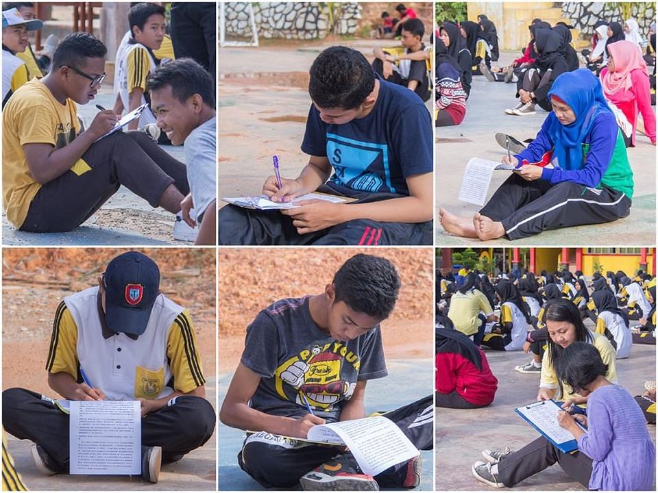 Učenici Sedme srednje škole u Batamu potpisuju peticiju protiv progona.