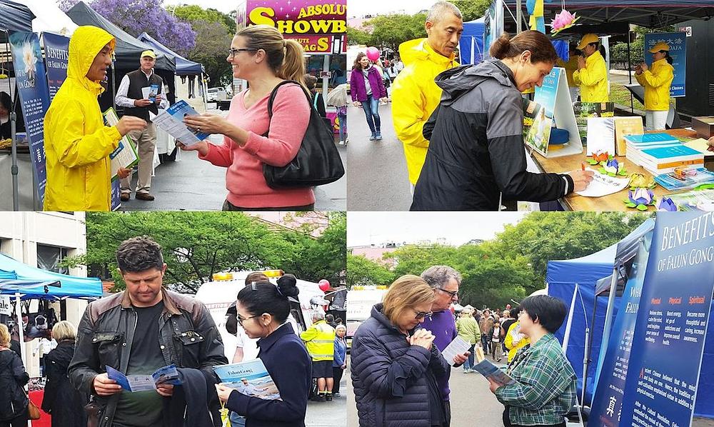 Prolaznici se informišu o Falun Gongu