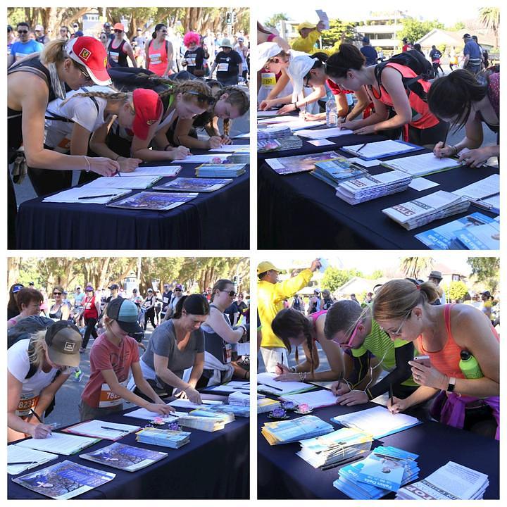 Potpisivanje peticije podrške naporima praktikanata da se okonča progon Falun Gonga u Kini.